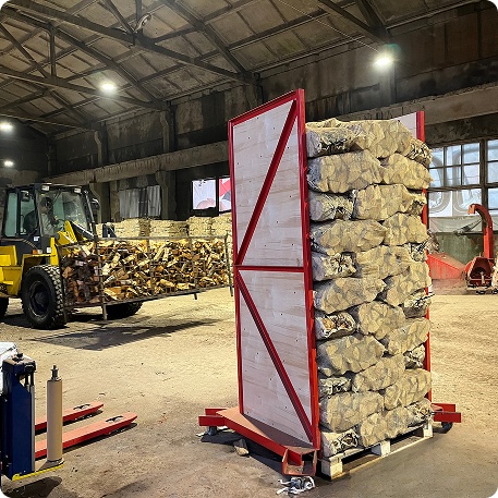 Wrapped pallet of firewood net bags in the warehouse